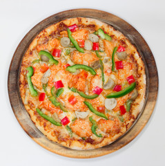 Delicious pizza top view, on white