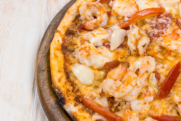 Delicious pizza on wood
