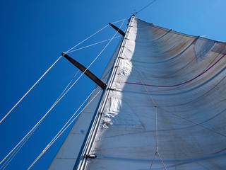 Sail of a sailing boat against sky