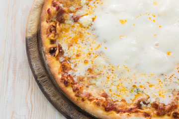 Delicious italian pizza on wood