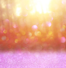 abstract photo of light burst among trees and glitter bokeh ligh