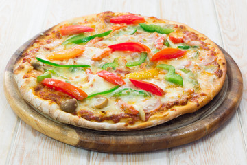 Delicious pizza on wood