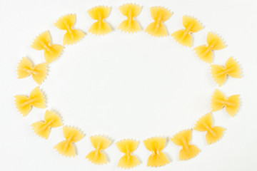 Raw farfalle pasta frame isolated on white background