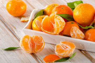 Fresh Tangerines  on   wooden background