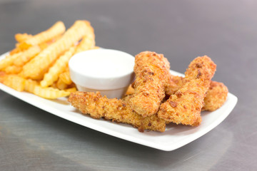 Fish dish - fried fish fillet with ftench fries
