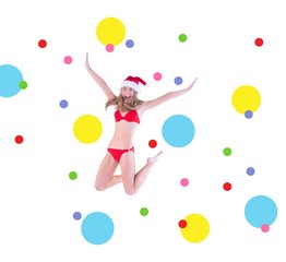 Obraz na płótnie Canvas Composite image of festive fit blonde in red bikini