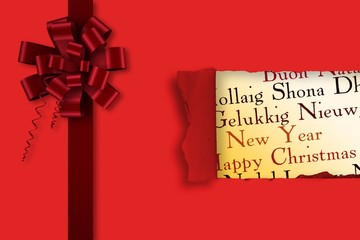 Composite image of red christmas bow and ribbon