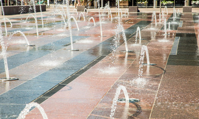 Water Spouts in Large Tiled Fountain