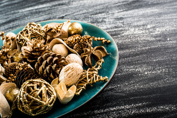 blue plate with a Christmas tree toys