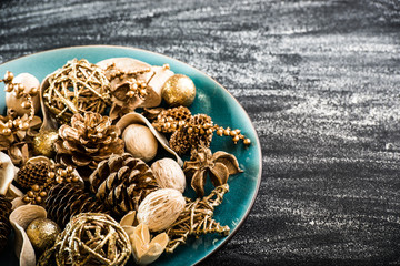blue plate with a Christmas tree toys