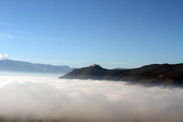 Fototapeta na wymiar Montecassino Abbey with fog