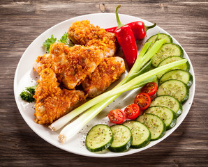 Grilled chicken nuggets and vegetables
