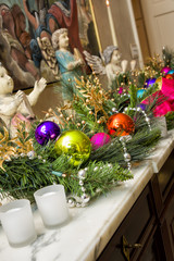 Christmas Ornaments on a Marble Mantle
