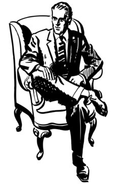 Man Sitting In Armchair