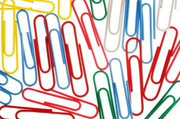 colorful paper clips isolated on white