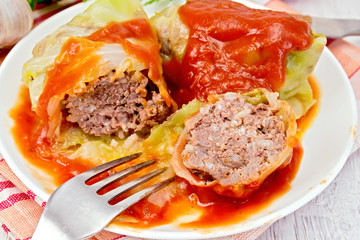 Cabbage stuffed with tomato sauce on napkin