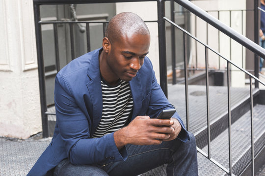 Black Guy Using Smart Phone