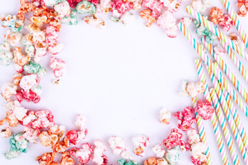 popcorn and drinking straws with space