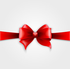 Invitation card with red holiday ribbon and bow