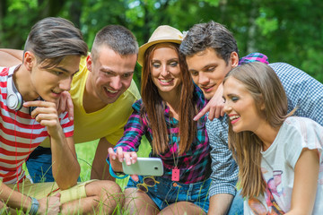 Friends Taking a Photo with Smartphone