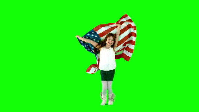 Festive little girl with usa flag in slow motion