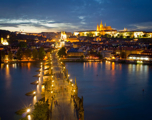 Fototapeta na wymiar Cityscape of Prague with Castle and Charles Bridge at night, Cze