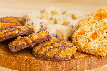 Variety of cookies on wooden table