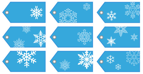Naklejka na ściany i meble Blaue Geschenkanhänger mit weißen Schneeflocken - Vektor