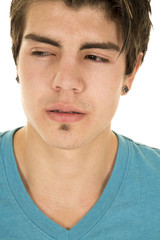 Obraz premium man in blue shirt head shot look serious to side