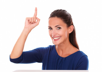 Attractive latin with finger pointing up