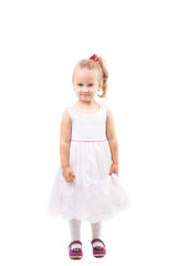 Cute little girl posing in studio