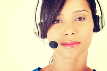 Beautiful young call-center assistant smiling