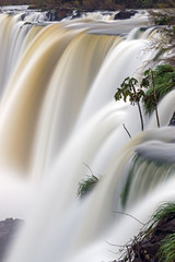 Detail of the Iguazu waterfall in Argentina with blurred motion