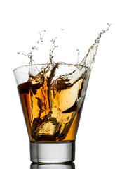 Isolated shots of whiskey with splash on white