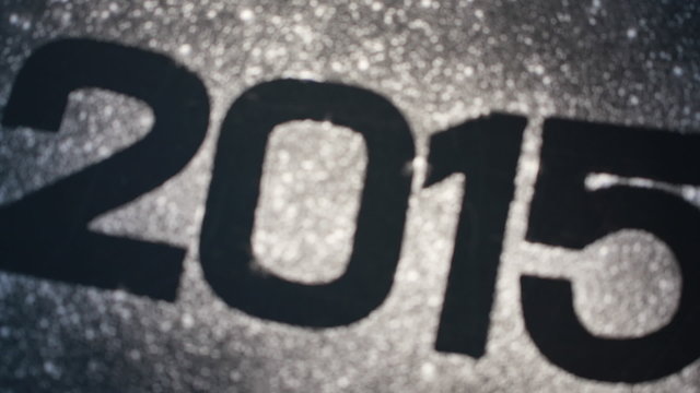 2015 in glitter on black surface