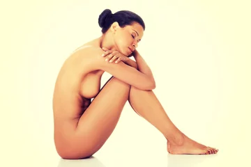 Gartenposter Sexy fit naked woman with healthy clean skin sitting © Piotr Marcinski