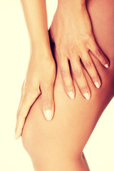 Young woman heaving leg injury