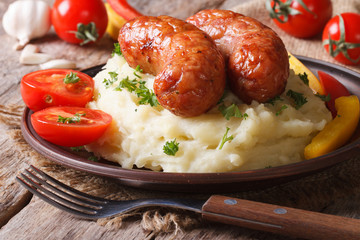 delicious sausages with mashed potatoes and fresh vegetables