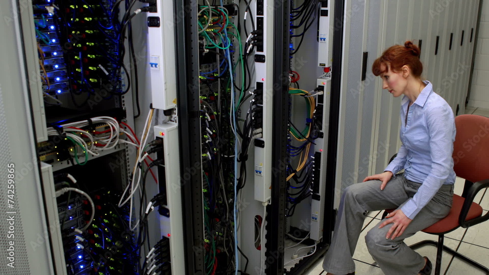 Aufkleber Technician working beside open server