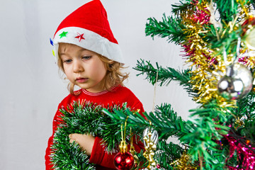 Happy small girl in Santa hat