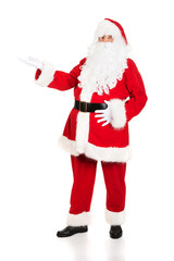 Full length Santa Claus with a welcome gesture