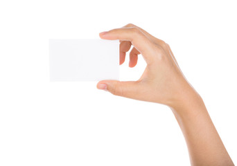 Fototapeta premium Women hand holding blank paper business card isolated on white b