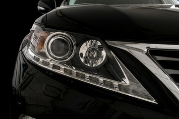 Obraz na płótnie Canvas Car headlights. Exterior detail.