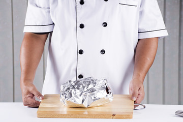 chef presented roast chicken