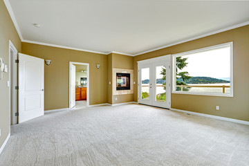 Empty master bedroom with walkout deck