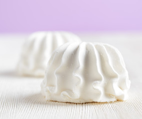 White marshmallow on wooden table