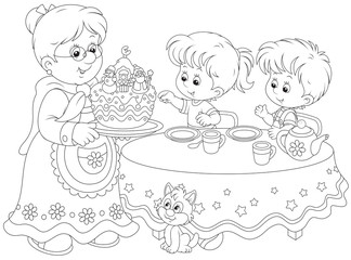 Granny and grandchildren with a Christmas cake