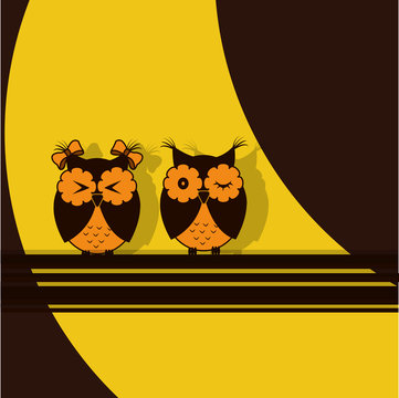 Two orange brown owl on a yellow and brown background