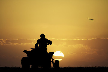 man on the quad at sunset © adrenalinapura