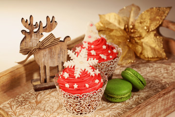 Red cupcakes decorated with snowflakes